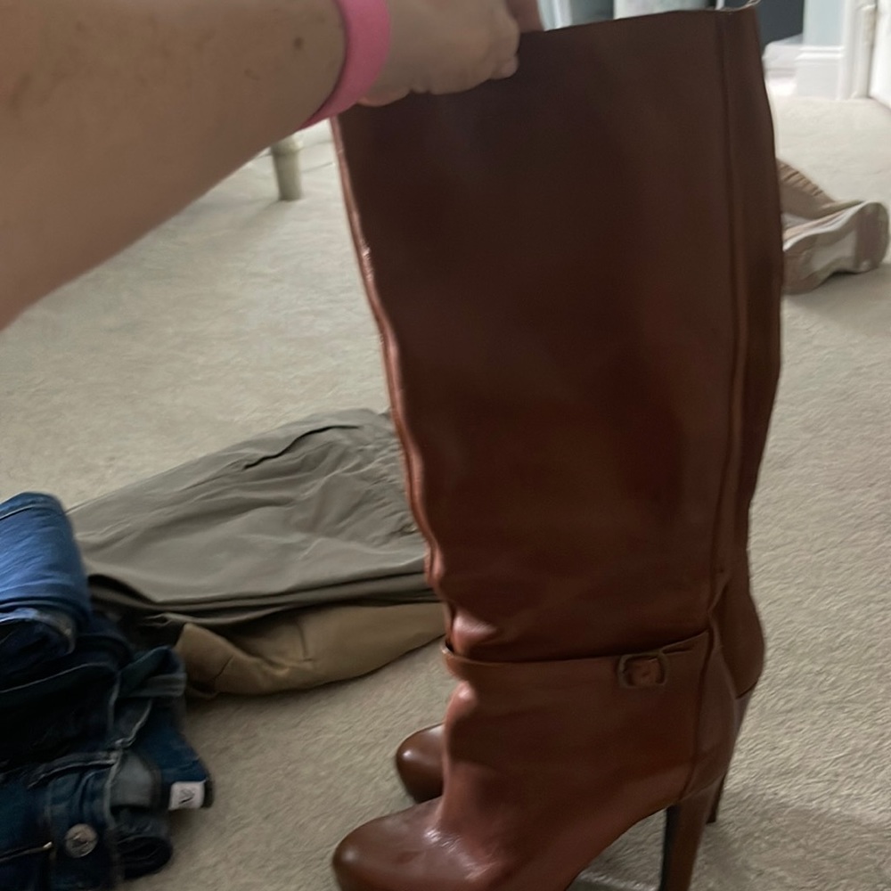 Jessica Simpson high heel boot with buckle detail and platform front